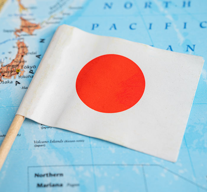 Bangkok, Thailand December 7, 2023, Japan flag on world map back